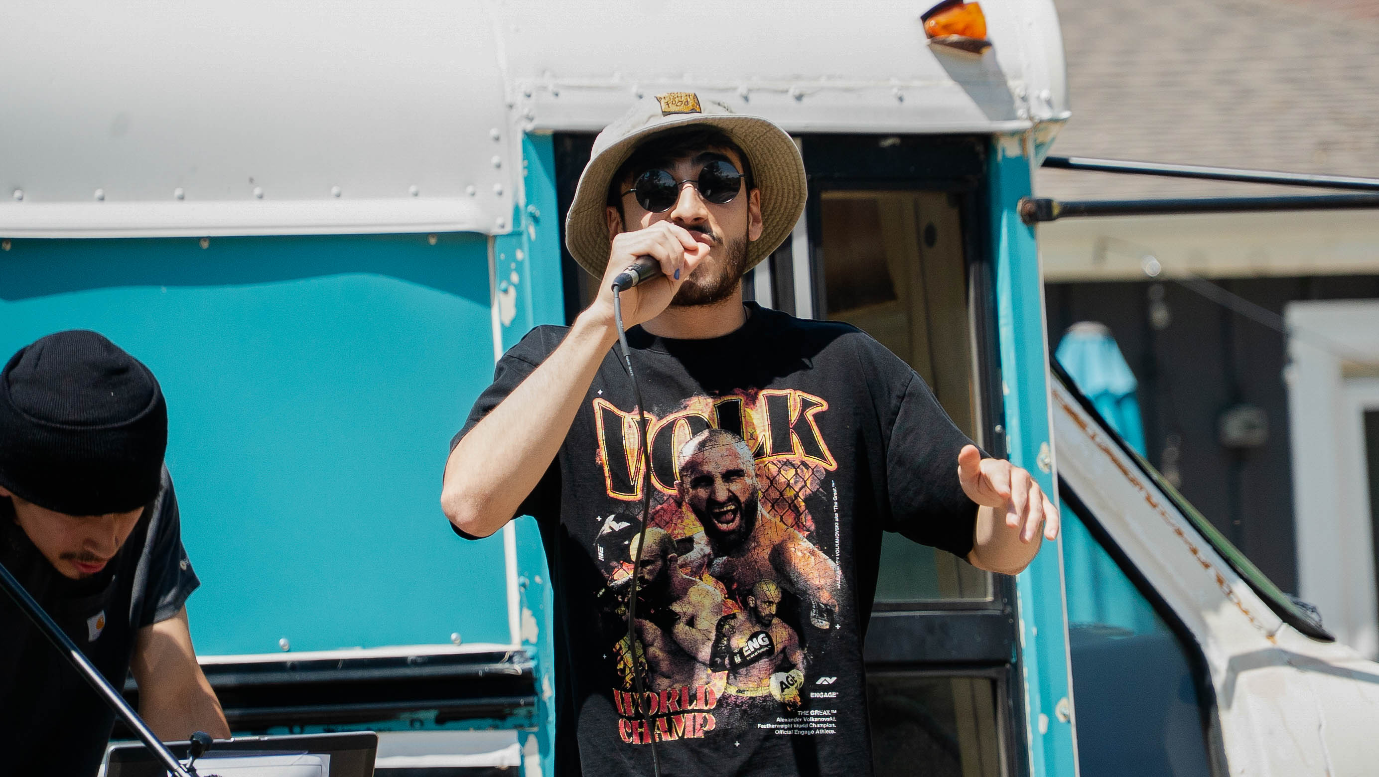 Tofu Tony performing with Slum at Stoopfest 2025 in Lansing, MI