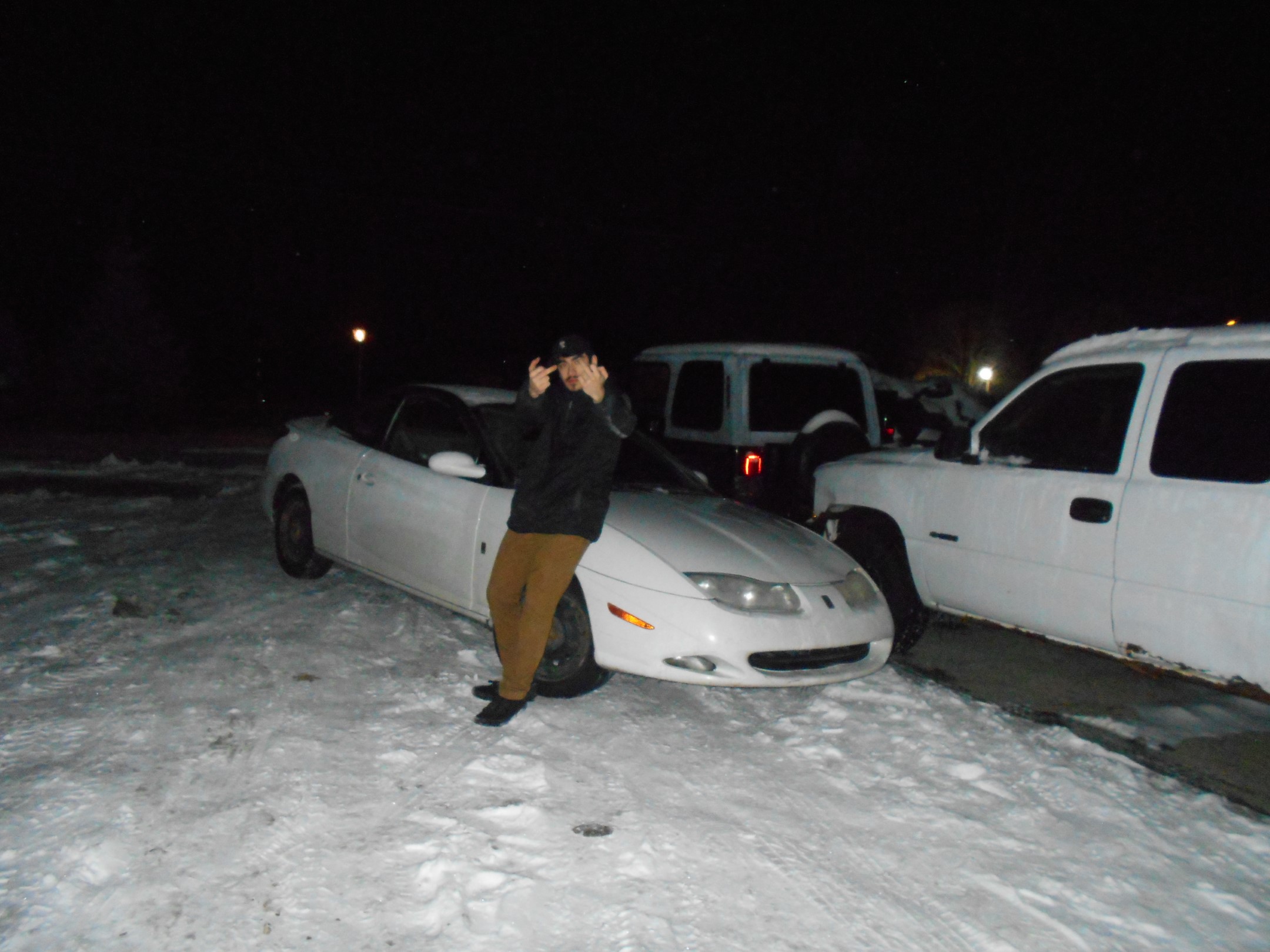 Tofu Tony in front of a Saturn SC2 Car