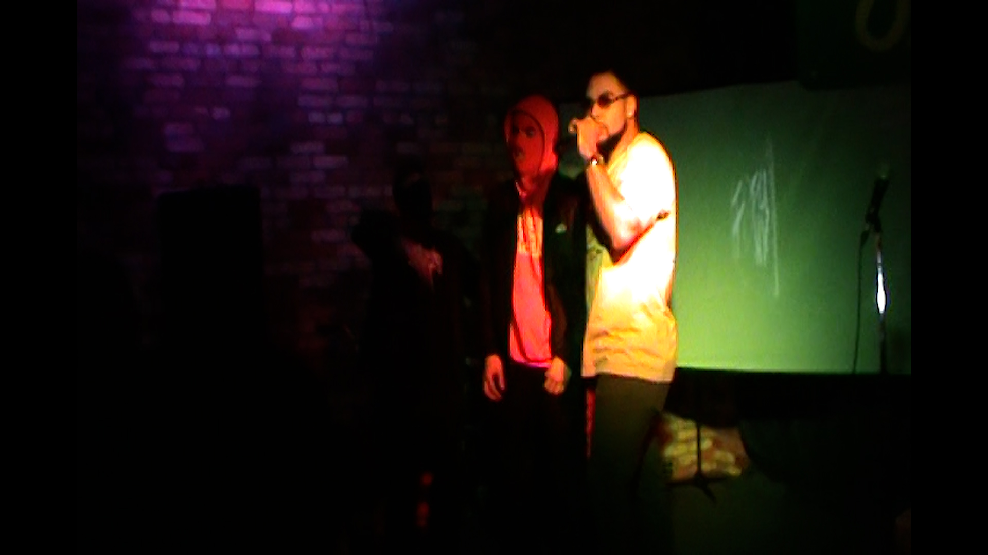 Tofu Tony performing with Slum and Jaye Flexx in Lansing, MI